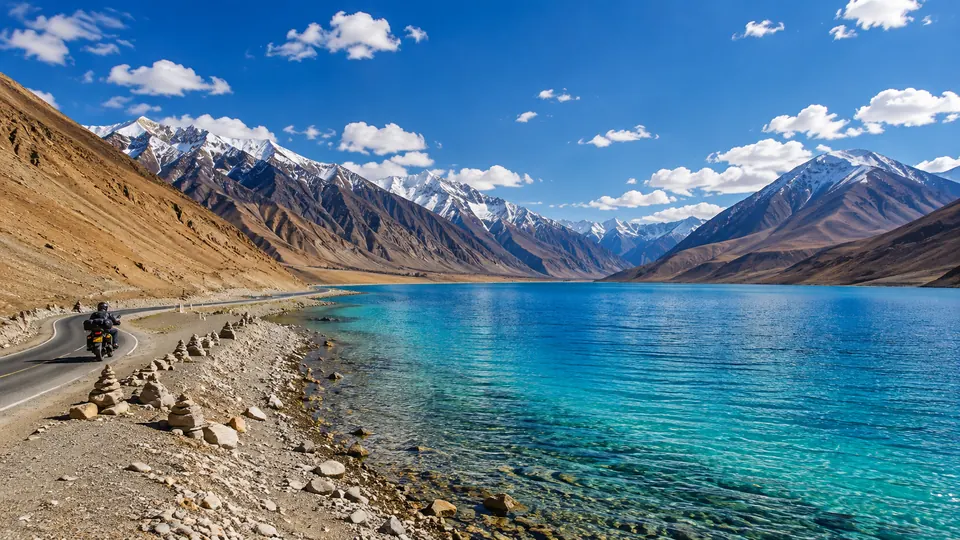 Pangong Lake in Ladakh, with snow-capped mountains above turquoise water